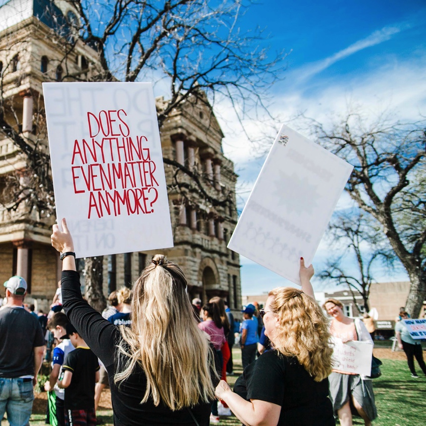 Demonstrator holding up a sign asking if anything even matters anymore, at the Our Lives rally in Denton, Texas, USA.