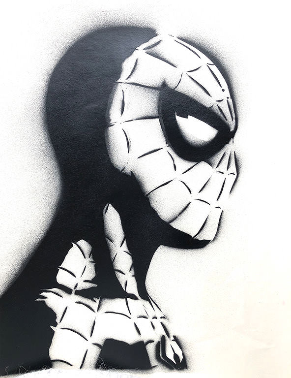 Black and white portrait of Spider Man in profile.